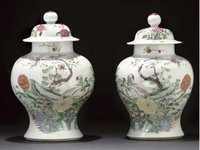 19th century A pair of famille rose baluster jars and cover